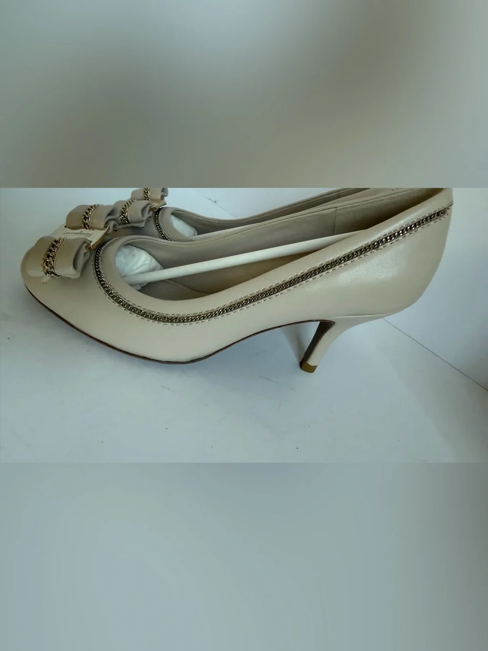 Salvatore Ferragamo Cream Vara Bow Flats with Gold Chain Accent